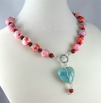 beaded necklace with heart pendant