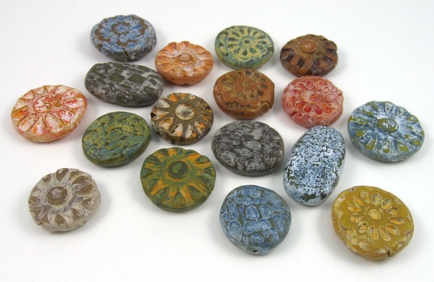 Spiced polymer clay beads with rustic finish.