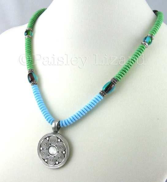 blue green necklace with spiral pendant