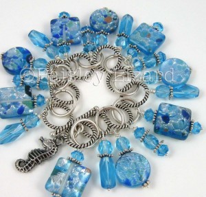 Blue glass beaded fringe bracelet with seahorse charm