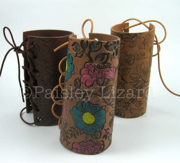 three faux leather cuffs