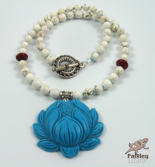 Beaded necklace with turquoise lotus pendant