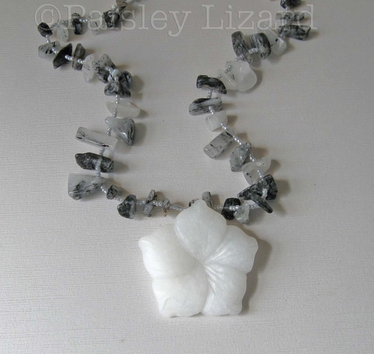Picture of white snow quartz flower necklace
