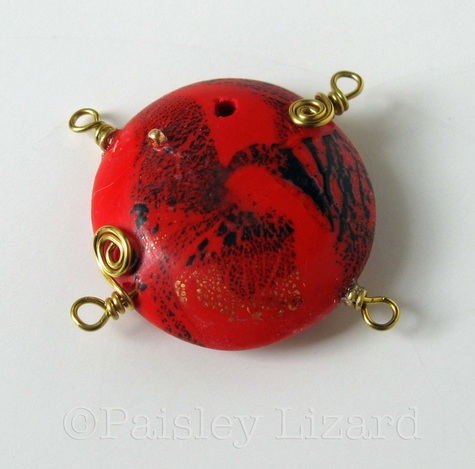 Picture of polymer clay bead with wire loops