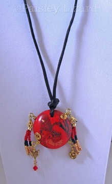 Picture of bead pendant necklace on display stand