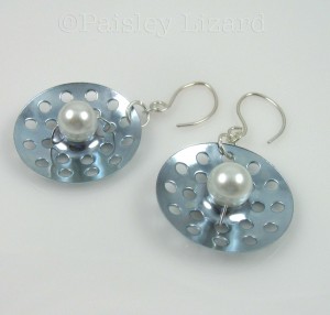 Futuristic pearl earrings