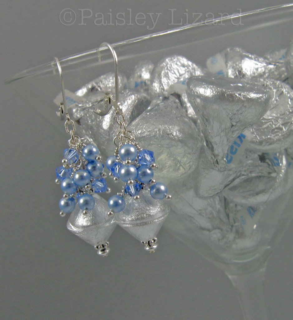 Frozen earrings on martini glass