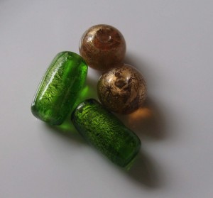 Foiled glass beads