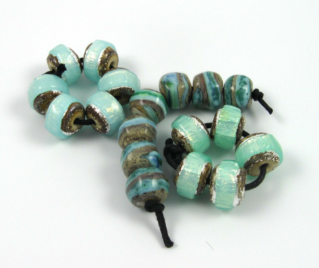 assorted blue lampwork beads