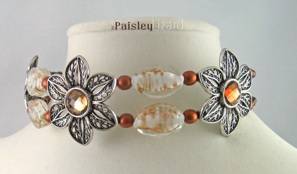 metal flower choker on display