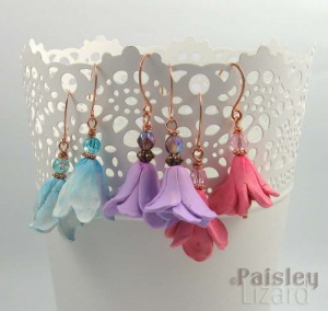 Rustic flower earrings hanging on planter