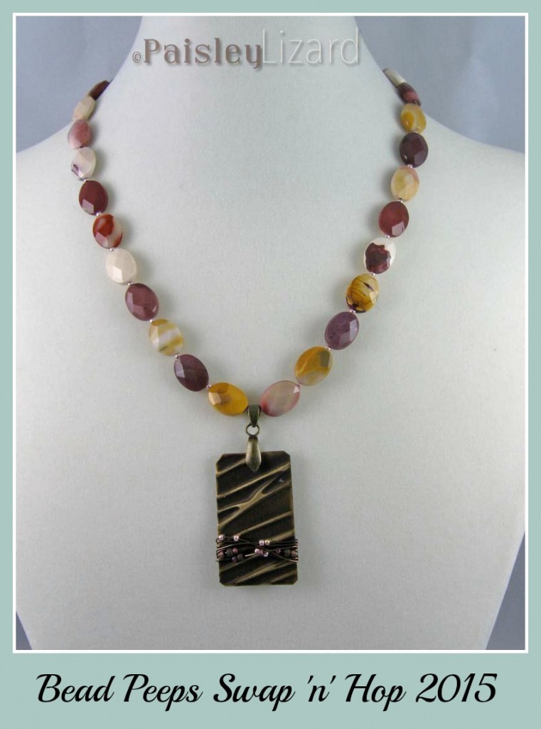 Moukaite bead necklace with brass pendant