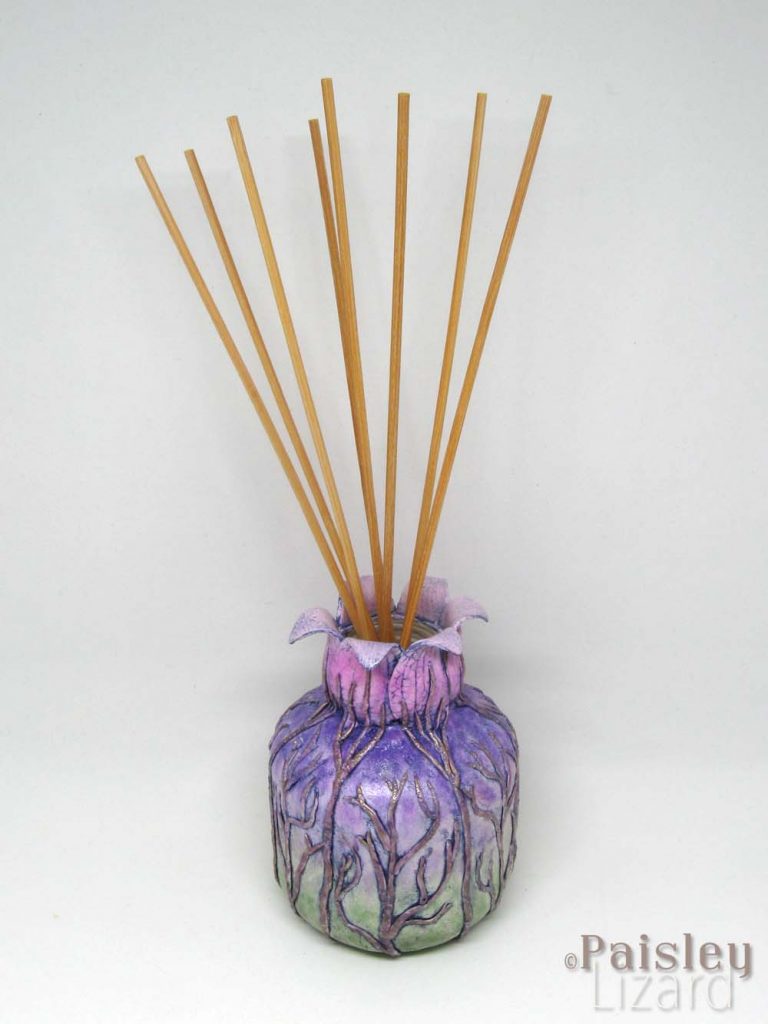 Mixed media seed pod sculpture reed diffuser