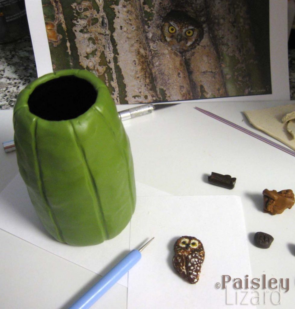 Saguaro cactus with pygmy owl vessel polymer clay sculpture in progress