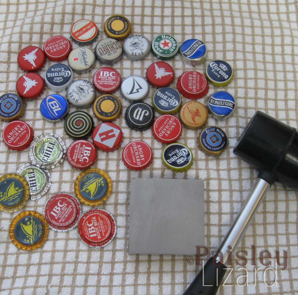 Bottle caps with mallet and bench block.