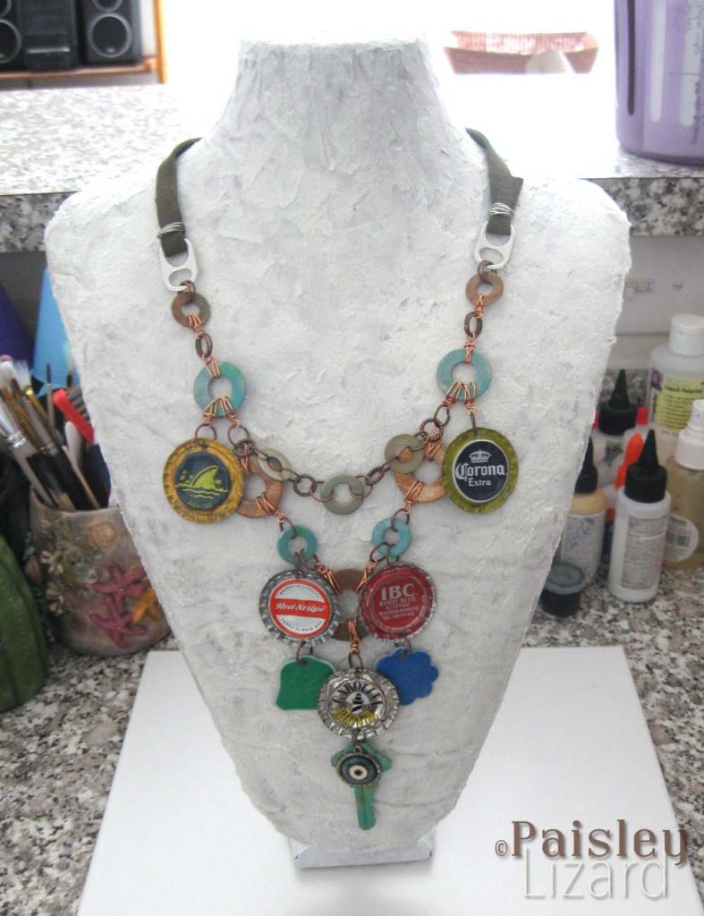 Upcycled necklace display with repurposed components necklace.