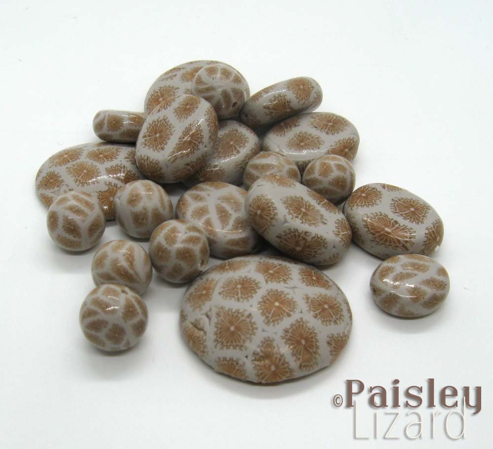 Faux petoskey stone beads made from polymer clay.