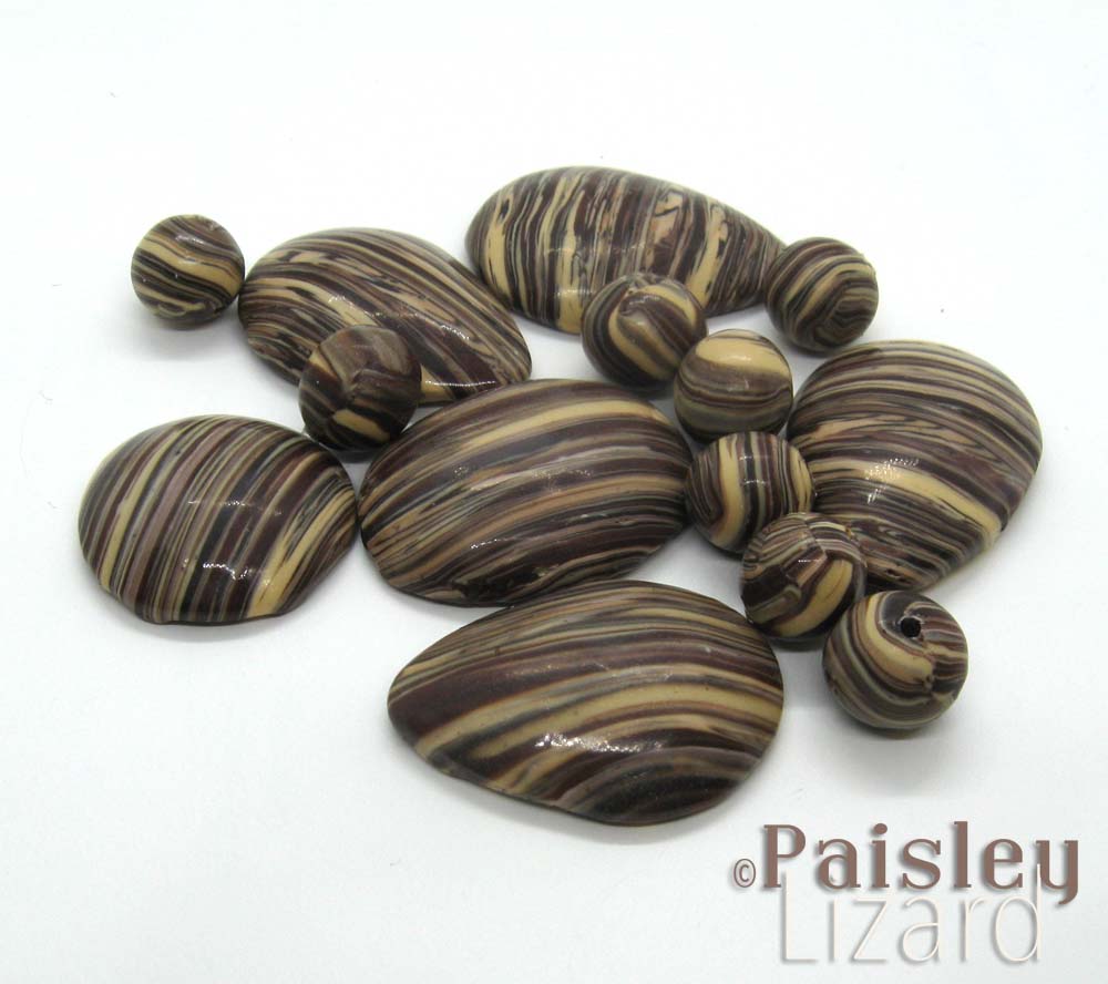 Faux petrified wood beads and cabochons made from polymer clay