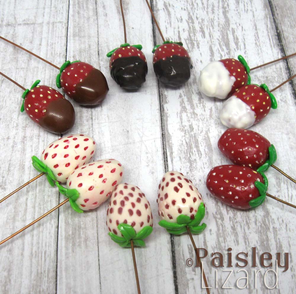 Polymer clay strawberry headpins with chocolate dipped effect