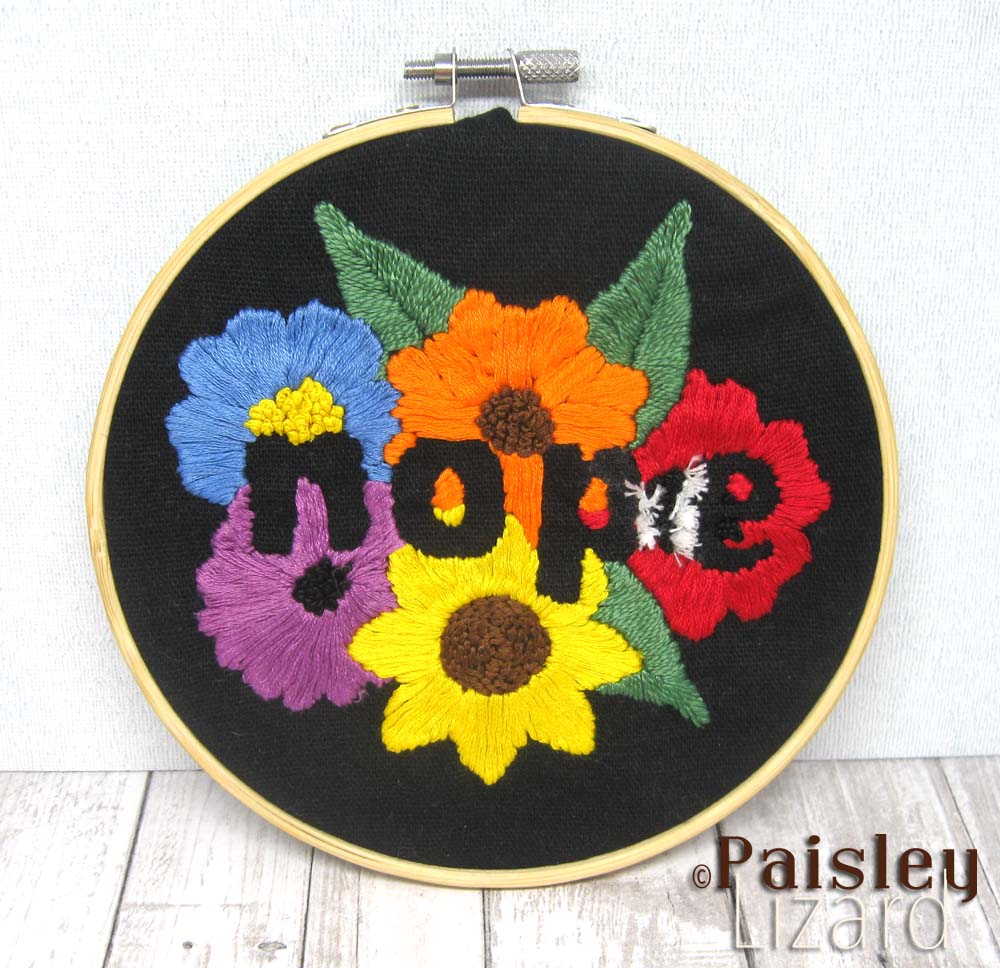 Modern hand embroidery "nope" flowers in hoop