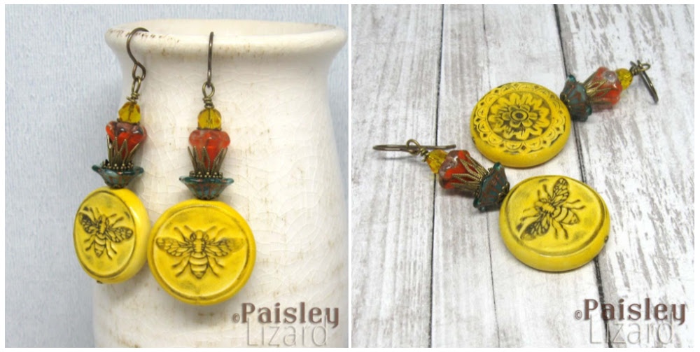 Dangle earrings with bee coin beads