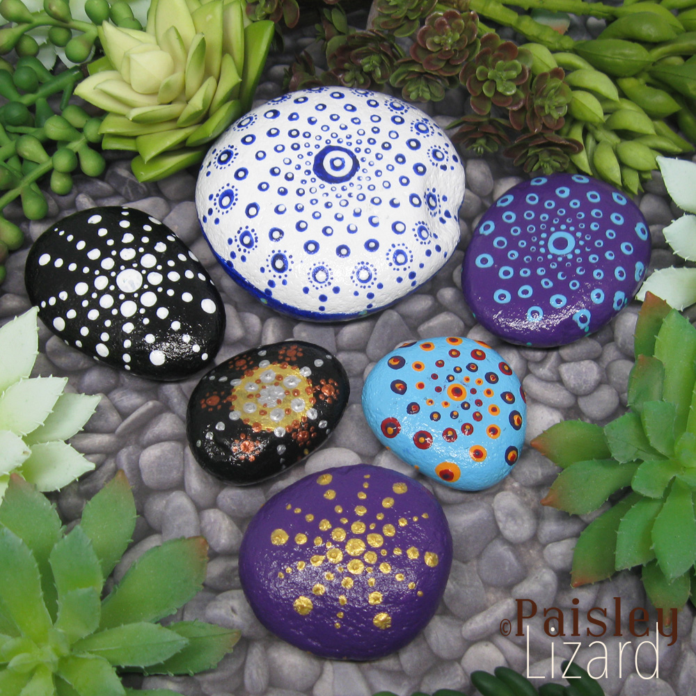 Six dot mandala painted stones.