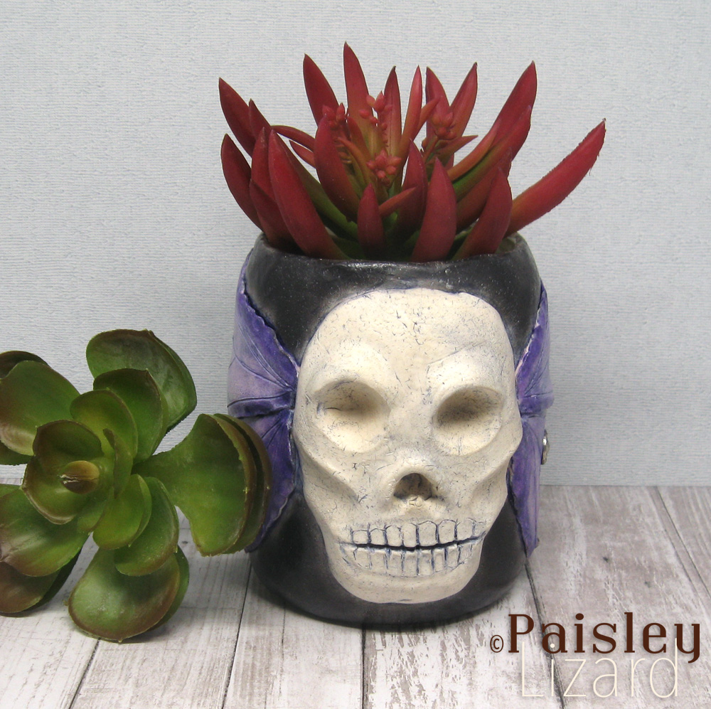 Polymer clay skull with wings planter and succulents