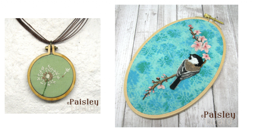 Embroidered dandelion pendant on ribbon necklace and an oval embroidery hoop with chickadee design stitched on blue backgroun.